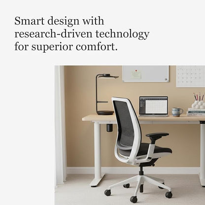 Steelcase Series 2 Office Chair - Ergonomic Work Chair with Wheels for Carpet - with Back Support, Weight-Activated Adjustment & Arm Support - Adjustable Rolling Chairs for Desk - Graphite