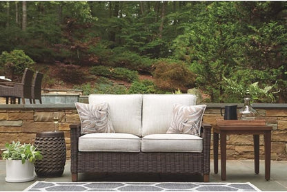 Signature Design by Ashley Paradise Trail Outdoor Loveseat with All Weather Cushions, Nuvella Weather Resistant Fabric, Medium Brown