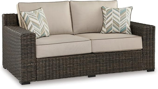 Signature Design by Ashley Coastline Bay Casual Weather Resistant Outdoor Loveseat with Cushion and 2 Throw Pillows, Nuvella Weather Resistant Fabric, Beige & Dark Brown
