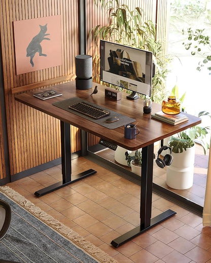FEZIBO One-Piece Standing Desk Adjustable Height Stand up Home Office Desk, 60x24 Inch Electric Standing Computer Desk, with 4 Memory Presets, Headphone Hook, Fixable casters, Black Walnut
