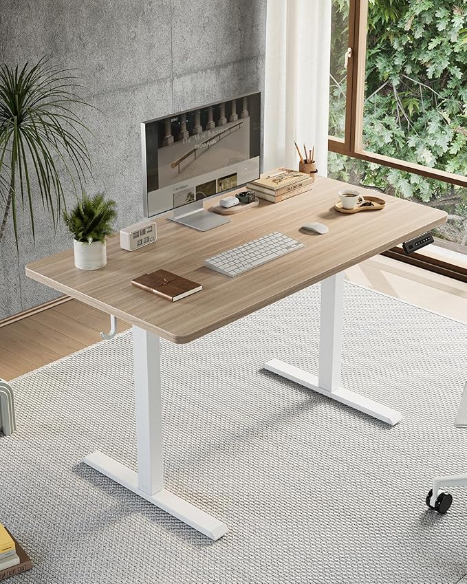 FEZIBO One-Piece Standing Desk Adjustable Height Stand up Home Office Desk, 55x24 Inch Electric Standing Computer Desk, with 4 Memory Presets, Headphone Hook, Light Walnut