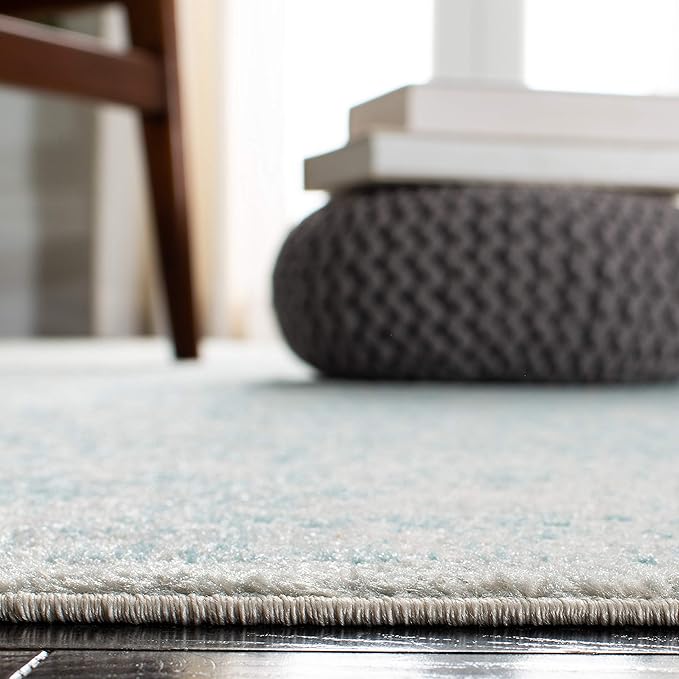 SAFAVIEH Evoke Collection Area Rug - 6'7" Round, Ivory & Aqua, Distressed Design, Non-Shedding & Easy to Clean, Ideal for Living Room, Bedroom, Dining Space (EVK256J)