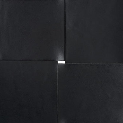 SAFAVIEH Couture Collection Devnie Black Woven Leather & Black Solid Wood Ottoman (Fully Assembled)