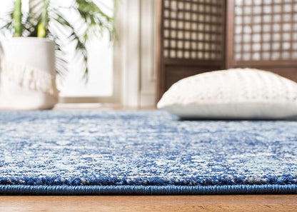 SAFAVIEH Evoke Collection Area Rug - 6'7" x 9', Navy & Ivory, Distressed Design, Non-Shedding & Easy to Clean, Ideal for Living Room, Bedroom, Dining Space (EVK256A)