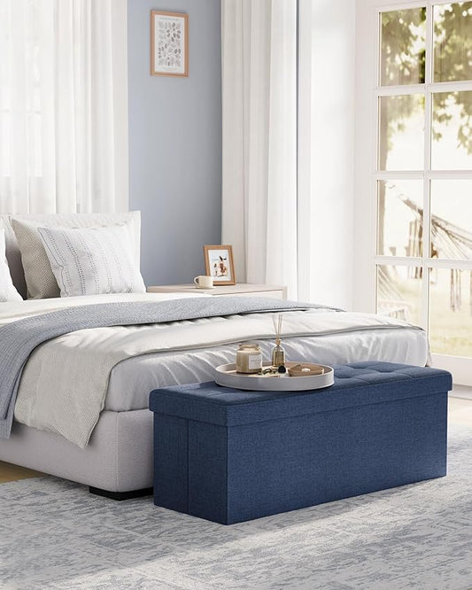 SONGMICS MAZIE Collection - 43 Inches Folding Storage Ottoman Bench, Ottoman Foot Rest, End of Bed Bench, Storage Chest, Load 660 lb, for Living Room, Bedroom, Entryway, Midnight Blue ULSF77IN