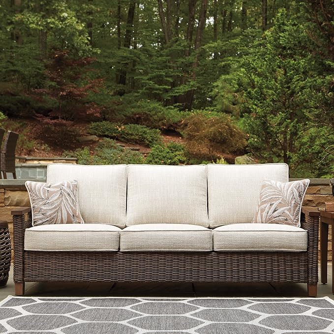 Signature Design by Ashley Paradise Trail Outdoor Patio Sofa with Cushion and 2 Throw Pillows, Cleanable Performance Fabric, Resin Wicker, Brown & Beige