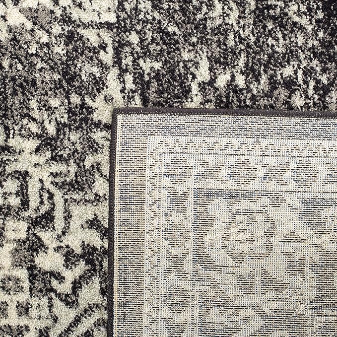 SAFAVIEH Evoke Collection Accent Rug - 2' x 3', Black & Grey, Distressed Design, Non-Shedding & Easy to Clean, Ideal for Front Door, Kitchen, Entryway, Accent Space (EVK256R)